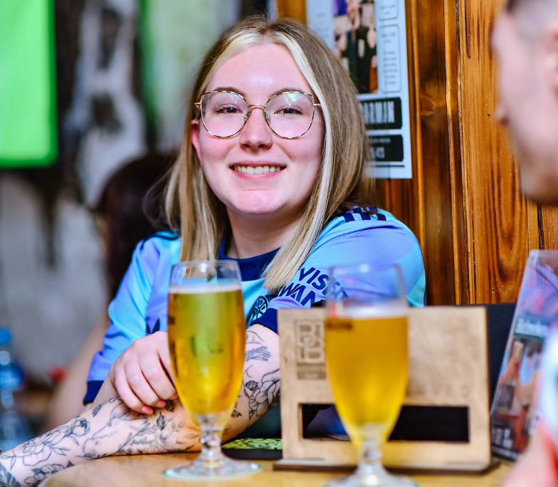 People enjoying cold beer at Brown's Bar Tbilisi